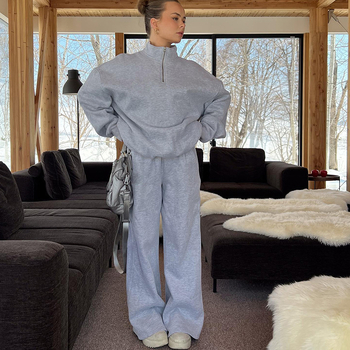 Φθινόπωρο και Χειμώνας 2025 Νέο Ευρωπαϊκό και Αμερικανικό Γυναικείο Casual Κοστούμι σε Καθαρό Χρώμα με Φερμουάρ και Στάσιμο στο Γιακά, Ελαστικό Παντελόνι σετ Δύο Τεμαχίων