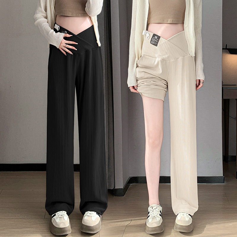 Várandós női nadrágok tavasszal és ősszel, széles szárú nadrágot viselnek, divatos, mindenhez illő, laza, hétköznapi, keresztpántos, függőleges, alacsony derekú nadrágok