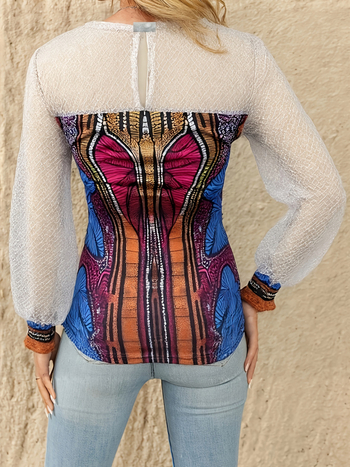 Európai és amerikai ruházati etnikai stílusú nyomtatott felsők hálós varrás átlátszó puffos ujjak karcsúsító megjelenésű retró hosszú ujjú póló