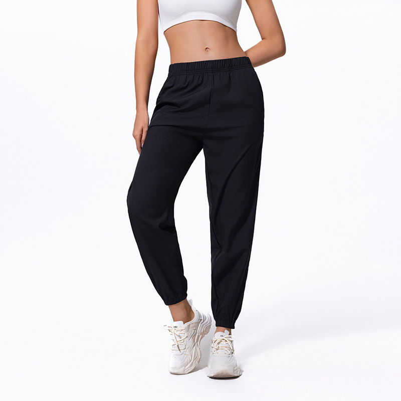 Női nyári egyszínű, egyszerű, zsebes, hosszú nadrág, lezser, sokoldalú, sportosan rövidített jogger nadrág