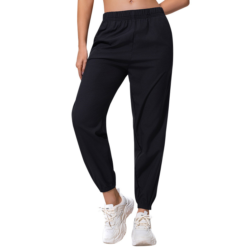 Női nyári egyszínű, egyszerű, zsebes, hosszú nadrág, lezser, sokoldalú, sportosan rövidített jogger nadrág