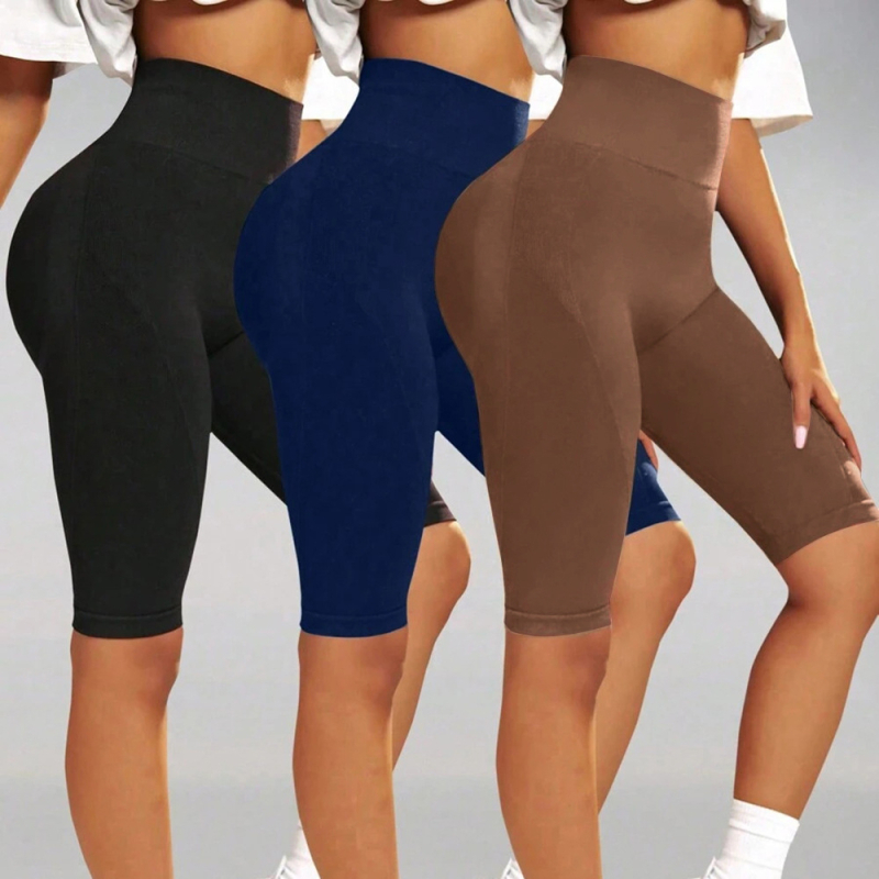 Moteriškos jogos kelnės su persikų spalvos klubų lavinimo, klubų pakėlimo, aukštu juosmeniu, pilvo raumenims skirtomis, elastingomis bėgimo treniruotėmis, greitai džiūstančiomis, aptemptomis sportinėmis kelnėmis.