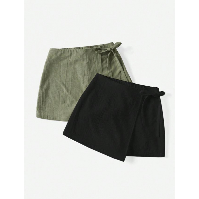 Amazon Cross-Border 2025 nyári új, tiszta színű, aszimmetrikus szegélyű, lezser, masnis női vászonszoknya