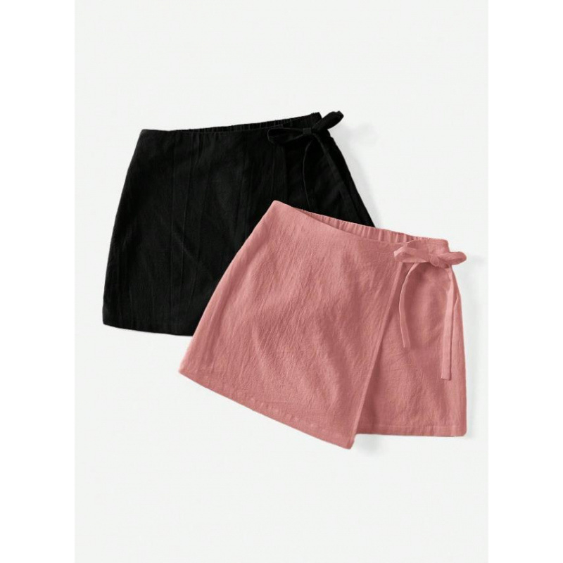 Amazon Cross-Border 2025 nyári új, tiszta színű, aszimmetrikus szegélyű, lezser, masnis női vászonszoknya