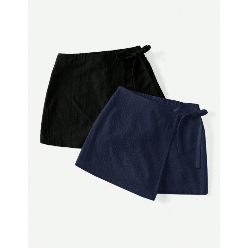 Amazon Cross-Border 2025 nyári új, tiszta színű, aszimmetrikus szegélyű, lezser, masnis női vászonszoknya