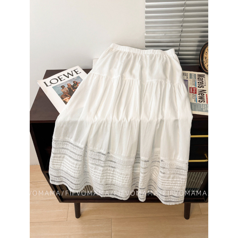 Francia fehér szoknya nőknek 2025 tavaszi és nyári új dizájn kivágott hímzett csipke középhosszú A-vonalú szoknya