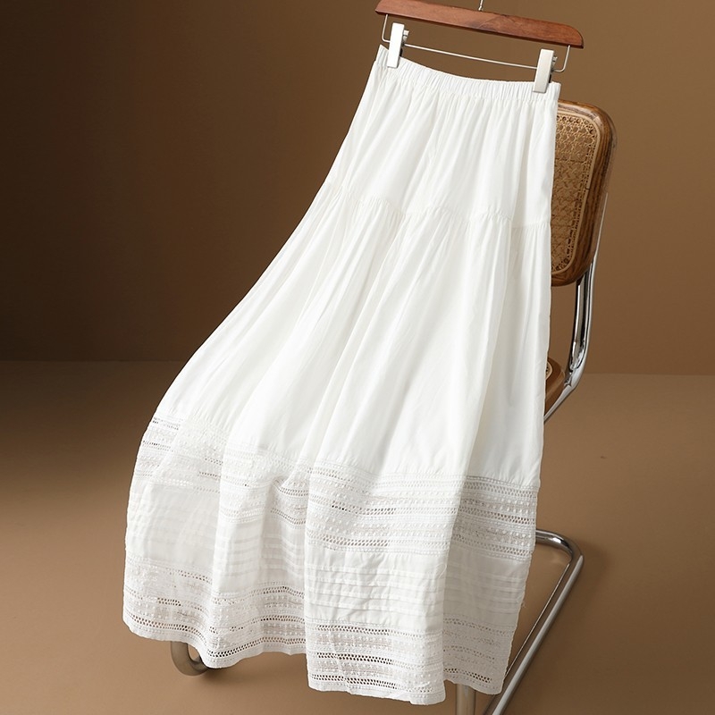 Francia fehér szoknya nőknek 2025 tavaszi és nyári új dizájn kivágott hímzett csipke középhosszú A-vonalú szoknya