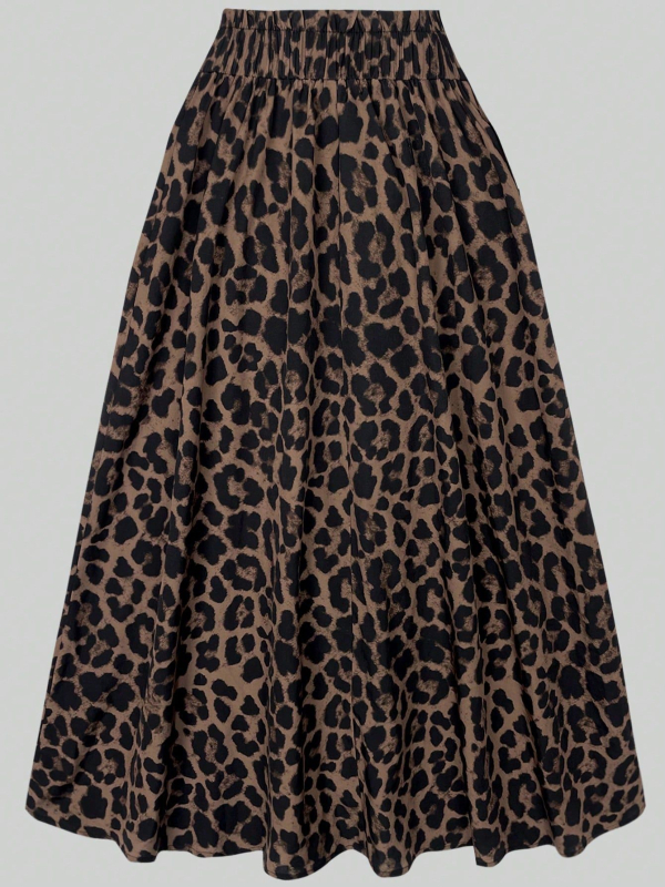 Külkereskedelmi raktáron lévő női fekete kerek nyakú, gombos, díszes hosszú ujjú póló, varrással, leopárdmintás ruha, külkereskedelem