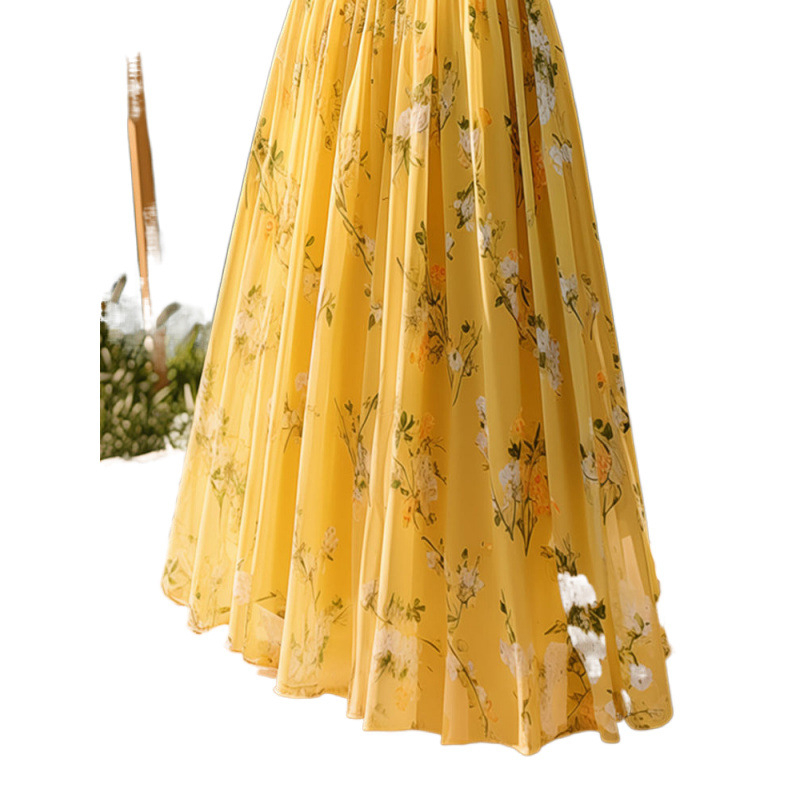 Francia stílusú sikkes és egyedi medálos elegáns sárga mintás szoknya női 2025-ös nyár új, divatos stílus, magas fazon