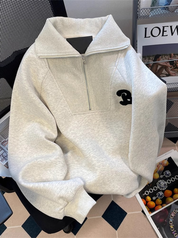 Határokon átnyúló e-kereskedelemmel népszerű kínai pamut kompozit hátsó gallérral borított szürke hajtókás félcipzáras női pulóver tavaszi és őszi amerikai nagykereskedelemben