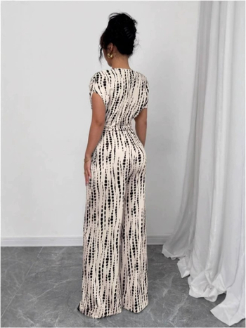 Amazon Aliexpress Ευρωπαϊκή και Αμερικανική Ριγέ Ολόσωμη Φόρμα 2025 Καλοκαιρινές Διακοπές Στυλ 2025 Ολόσωμη Φόρμα με Δέσιμο και Έξω τους Ώμους, Φαρδιά Μακριά στο Πόδι