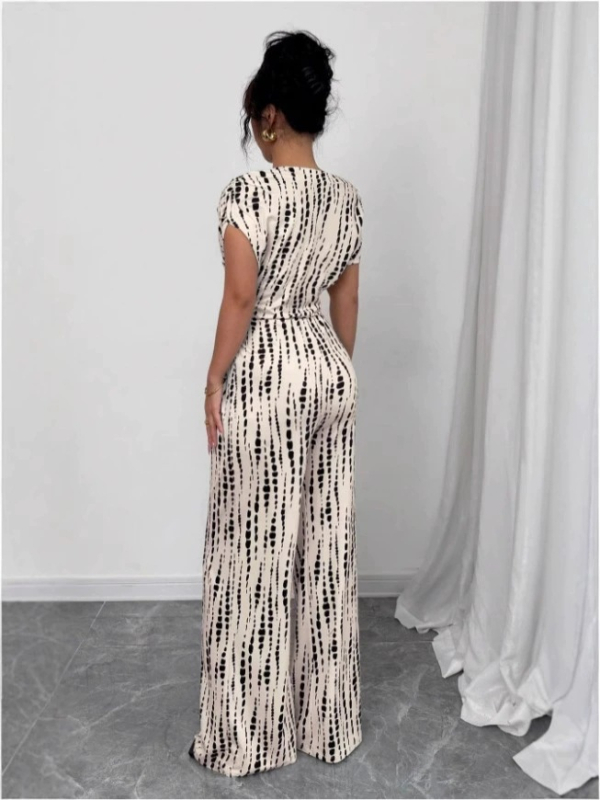 Amazon Aliexpress európai és amerikai csíkos overál 2025 nyári vakációs stílusú, váll nélküli, megkötős, széles szárú, hosszú overál