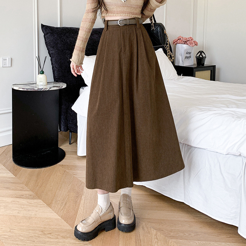 Hosszú szoknya nőknek 2024 őszi és téli új magas derekú koreai stílusú széles szegélyű rakott ágyékvédő karcsúsító megjelenésű kordbársony középhosszú szoknya
