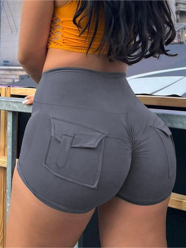 Naujos europietiškos ir amerikietiškos daugiaspalvės, aukšto liemens, besiūlės, persikinės spalvos, jogos šortai su trijų taškų kišenėmis bėgimui ir treniruotėms. Karštos kelnės.