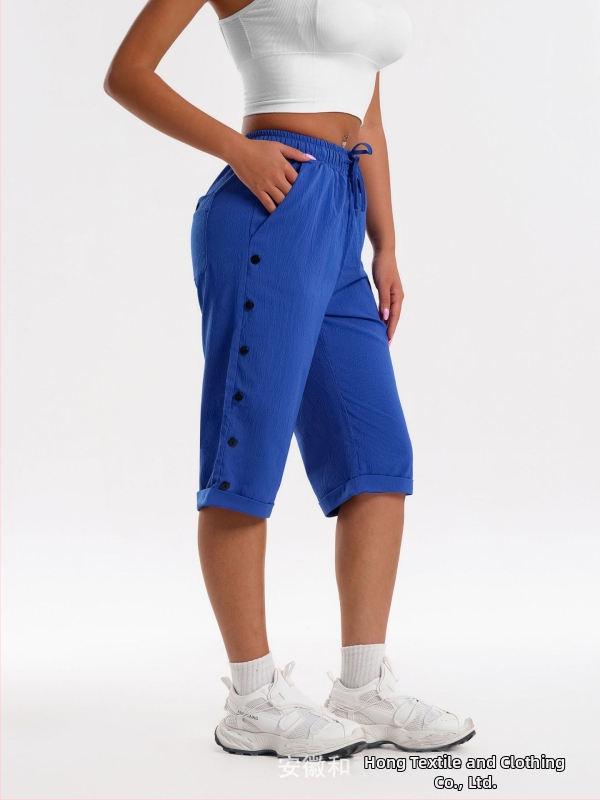 CrossBorder női rövidnadrág, divatos, lezser strandnadrág, háromnegyedes rövidnadrág rugalmas derékkal, húzózsinórral és gombdíszítéssel