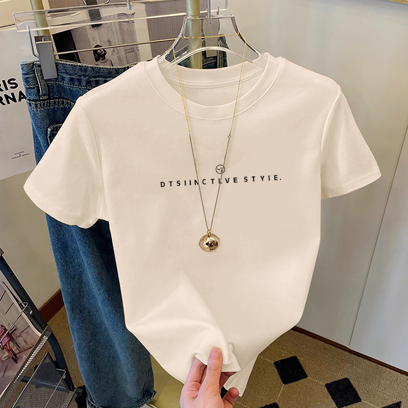 2025-ös új stílusú jobb vállú pamut rövid ujjú póló, női divatos, sokoldalú, korcsökkentő, karcsúsító megjelenésű fehér póló, trendi nyári