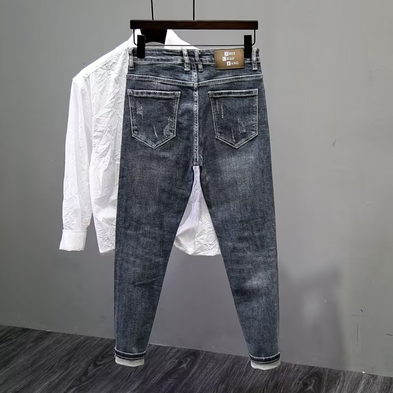 Vékony, szakadt farmer, férfi 2024-es új nyári, erősen mosott, karcsúsított, kis lábfejű, lezser, divatos nadrág