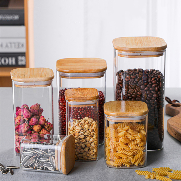 Kõrge borosilikaatklaasist säilituspurk köögipudeli teehelveste kommid bambusest puidust kaanega suletud purk ruudukujuline säilituspurk