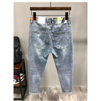 Sötét farmer férfi szakadt foltos 2023 tavaszi új koldusnadrág koreai stílusú karcsúsított, rugalmas nadrág férfiaknak