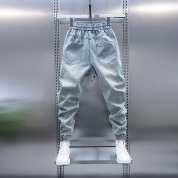 2025 tavasz Új világoskék farmer nagy zsebes szárú, lezser nadrág Trendi márkájú tinédzser háremnadrág