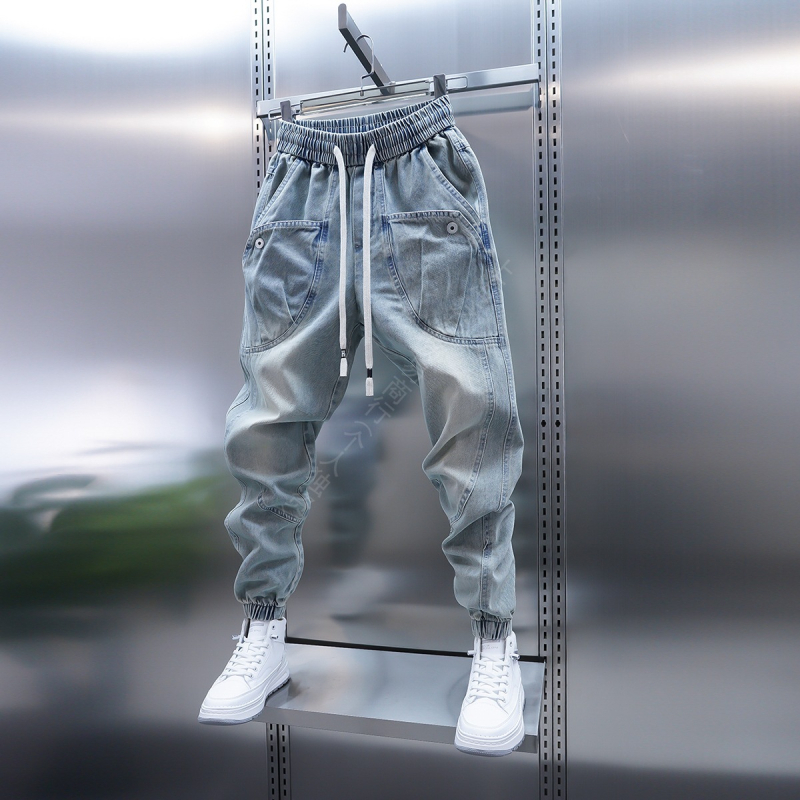 2025 tavasz Új világoskék farmer nagy zsebes szárú, lezser nadrág Trendi márkájú tinédzser háremnadrág