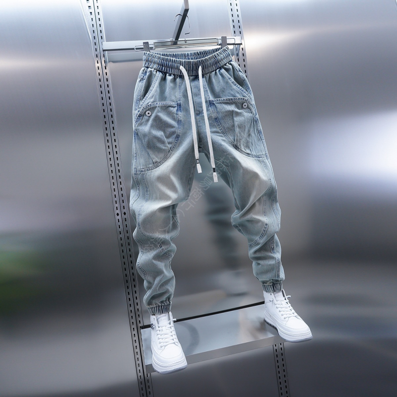 2025 tavasz Új világoskék farmer nagy zsebes szárú, lezser nadrág Trendi márkájú tinédzser háremnadrág