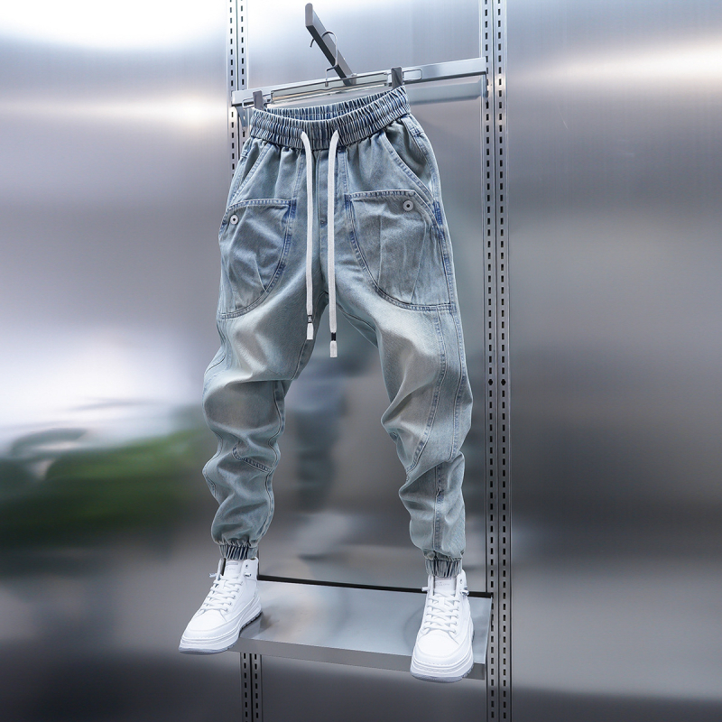 2025 tavasz Új világoskék farmer nagy zsebes szárú, lezser nadrág Trendi márkájú tinédzser háremnadrág