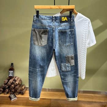 Határokon átnyúló divatos márkájú tűvel varrott farmer férfi varrószalag karcsúsított kis méretű egyenes szárú nadrág strapabíró hímzett kölyökkutyák jóképű személyes stílus