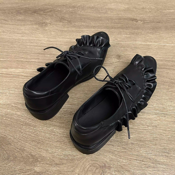 Άνοιξη 2025 Μοντέρνα Ευρωπαϊκά και Αμερικανικά σχέδια σε στυλ niche, πρωτότυπα σκούρα, δερμάτινα παπούτσια με βολάν και κορδόνια, με χοντρό τακούνι.