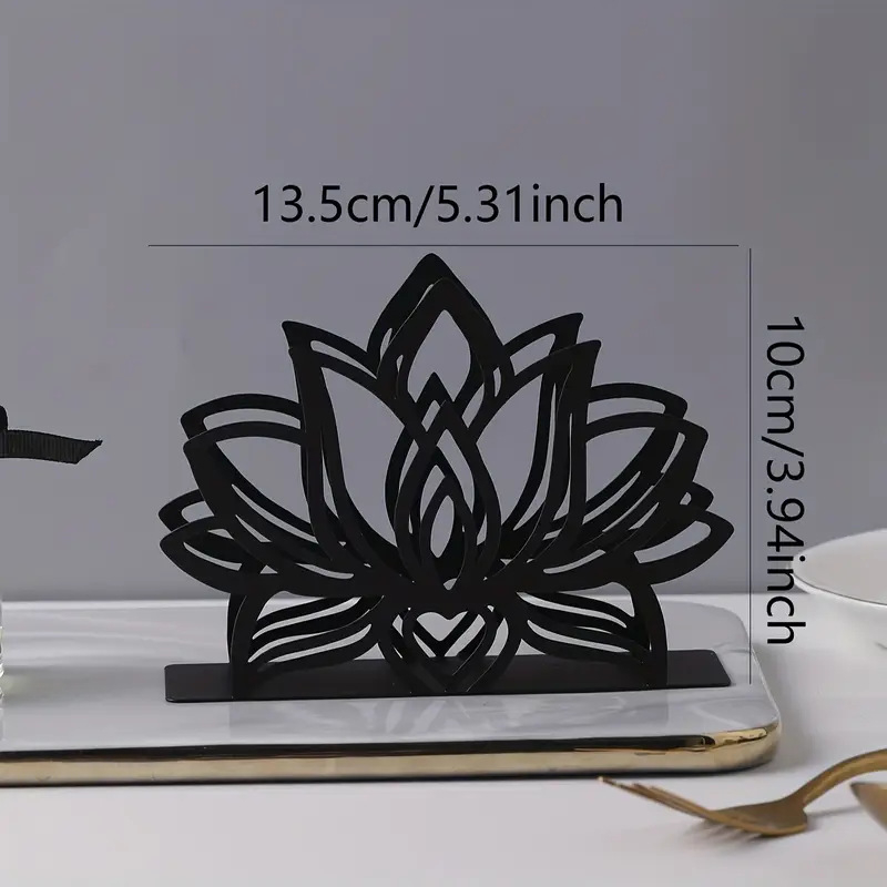 Elegantiškas juodo metalo „Lotus“ servetėlių laikiklis, madingas virtuvės ir restorano stalinių servetėlių laikiklių aksesuaras, parduodamas tarpvalstybiniu mastu.
