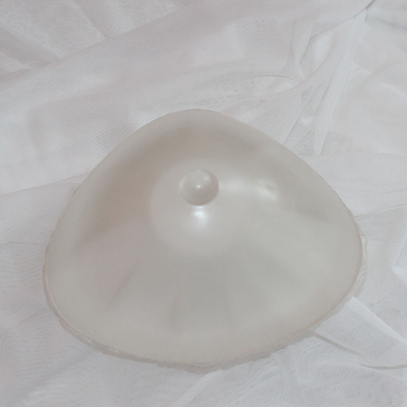 Kolmnurkne läbipaistev meditsiiniline silikoonprotees silikoonist vale rinnarind operatsioonijärgne alternatiivne proteeside tehas