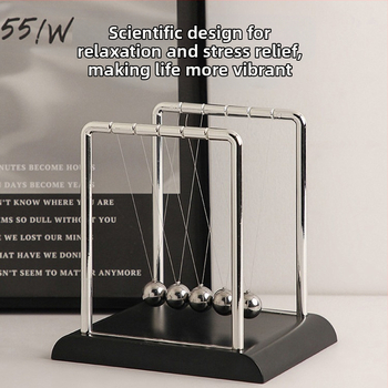 Newtoni pendlikuul, igiliikuriga instrument, magnetiline levitatsioon, väikesed kaunistused, kodune õppetöö, laud, loominguline dekoratiivkäsitöö