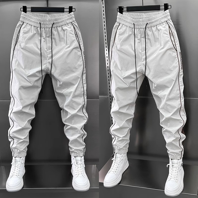 Trendi tavaszi és nyári vékony, gyorsan száradó, lezser nadrág, férfi varrásos, perforált, légkondicionált, szűk szabású nadrág