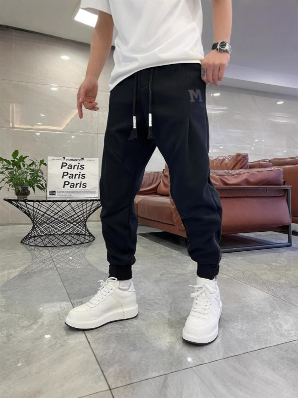 Trendi márka 2025 új férfi egyszínű lezser nadrág koreai stílusú cipzáras melegítőnadrág férfi tavaszi és nyári harlan nadrág