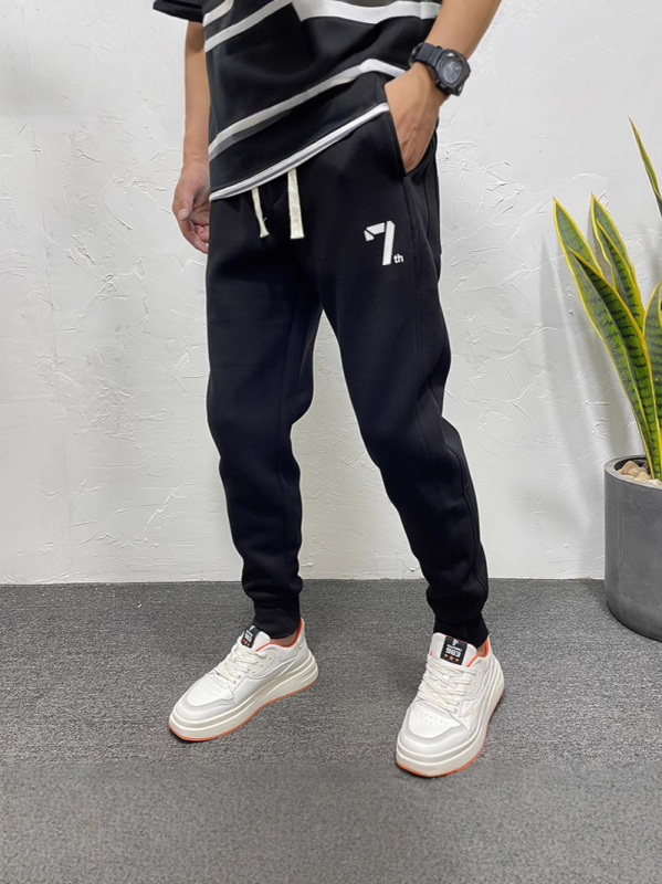 Trendi márka 2025 új férfi egyszínű lezser nadrág koreai stílusú cipzáras melegítőnadrág férfi tavaszi és nyári harlan nadrág