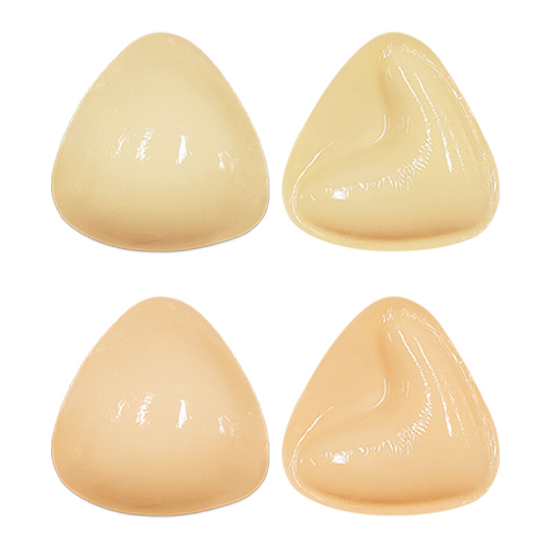 Kahepoolsed kleepuvad kolmnurksed rinnahoidjapadjad väikesele rinnale, nähtamatud V-kujulised paksendatud sisetükid, isekleepuvad käsnrinnahoidjapadjad