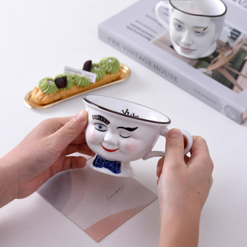 Loominguline retro näoga vibu paaritassi kontorikohvipiima keraamiline kruus