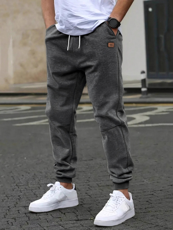 Tarpvalstybiniai sprogimai vyriškos laisvalaikio sportinės kelnės kelnės Europos tarpvalstybinių vyriškų drabužių kodas