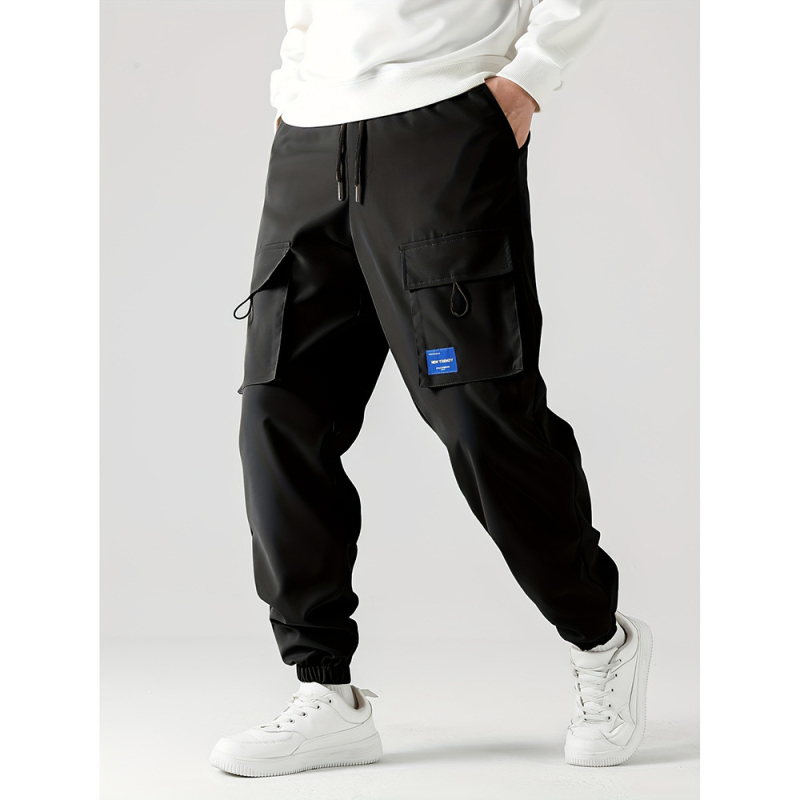 Határokon átnyúló európai méretű export 2025 új lezser nadrág férfi 2025 laza lábszárkötős funkcionális divatos márkás sport cargo nadrág