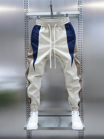 Μοντέρνο ανδρικό παντελόνι jogger σε χρωματικές αποχρώσεις του 2025, λεπτό παντελόνι γρήγορου στεγνώματος σε χρωματικές αντιθέσεις, αθλητικό παντελόνι για νέους, ανδρικό και αθλητικό στυλ