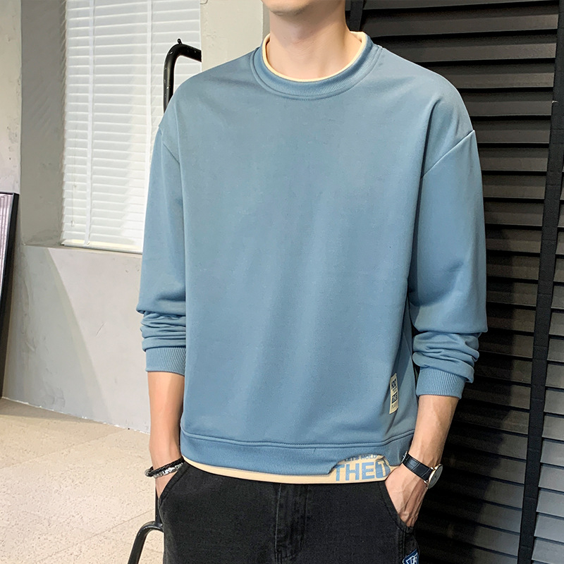 Határokon átnyúló külkereskedelmi élő közvetítés Népszerű tavaszi és őszi vakációs kétrészes pulóver fiatal férfiaknak koreai stílusú sportfelső és alsó ing