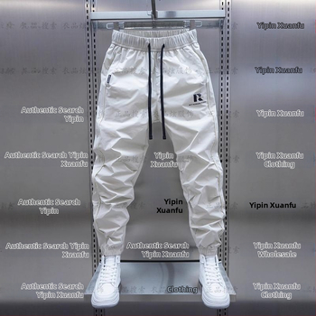 Tavaszi és őszi új férfi lezser nadrág koreai stílusú, gyorsan száradó, laza szárú, divatos, egyszínű, minden lábra illeszkedő nadrág