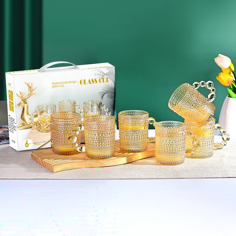 Cana de sticlă cu mâner colorat, îngroșată și rezistentă la temperaturi ridicate, cană de cafea de calitate superioară pentru uz casnic, cană de apă gravată, en-gros din fabrică