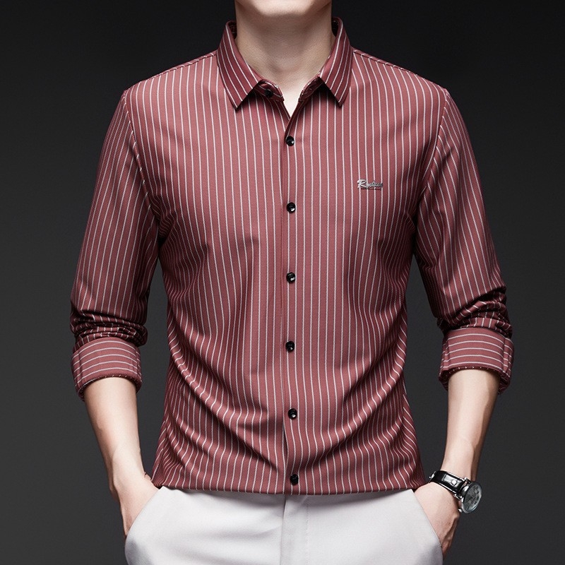 Tavaszi és őszi új, hosszú ujjú, varratmentes férfi ingek fiataloknak és középkorúaknak, divatos, lezser, függőleges csíkos férfi ingek