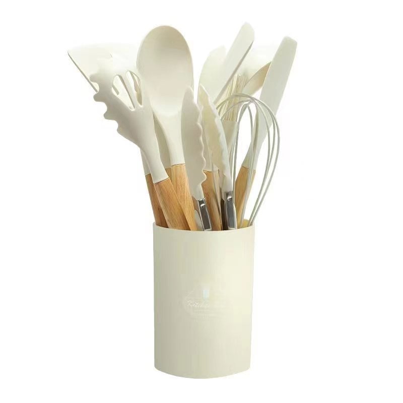 Nepridegančios silikoninės keptuvės virtuvės reikmenys silikoninis kastuvas šaukštas grandiklis tarp sienų 12 dalių medinė rankena virtuvės reikmenų rinkinys sandėlyje gamyklos kaina didmeninė prekyba