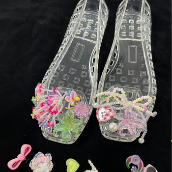 Krokodillkingad Kristallkingad Želeekingad Krokodillkingad Lillelised želeekingad Dekoratiivsed kingalilled Isetegemise aksessuaarid Kingalilled Kingapandaalid