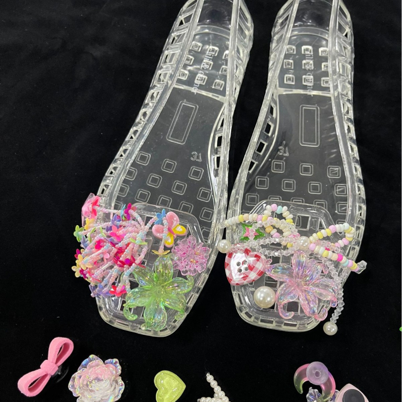 Krokodillkingad Kristallkingad Želeekingad Krokodillkingad Lillelised želeekingad Dekoratiivsed kingalilled Isetegemise aksessuaarid Kingalilled Kingapandaalid