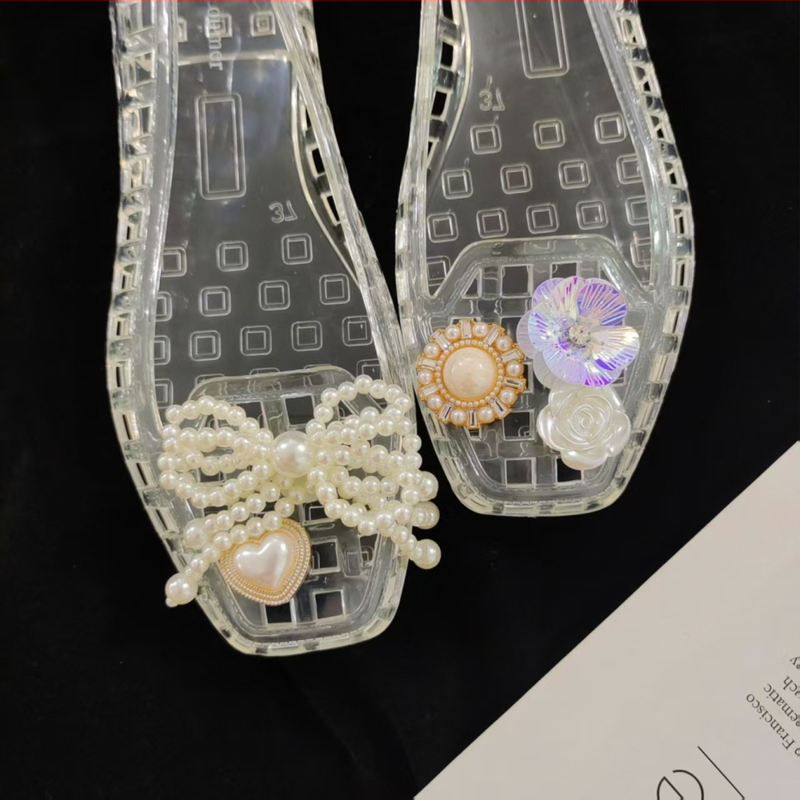 Krokodillkingad Kristallkingad Želeekingad Krokodillkingad Lillelised želeekingad Dekoratiivsed kingalilled Isetegemise aksessuaarid Kingalilled Kingapandaalid