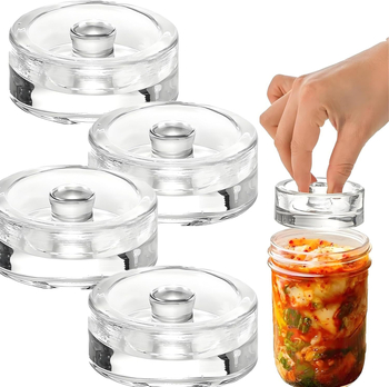 „Amazon“ tarpvalstybinės elektroninės prekybos fermentuoti stikliniai svareliai su lengvai suimamomis rankenomis tinka maistui laikyti plačiakakliuose stiklainiuose.