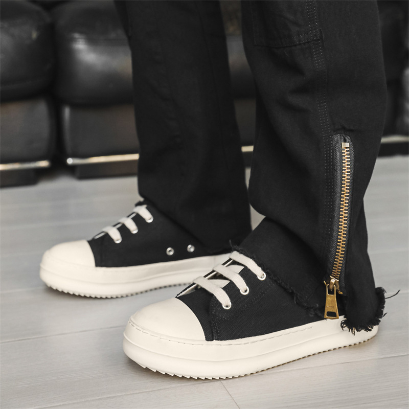 Lõuendikingad 2024. aasta uued niššiga paaridele mõeldud vulkaniseeritud madala säärega kingad, küljelukuga trendikad vabaaja meeste kingad